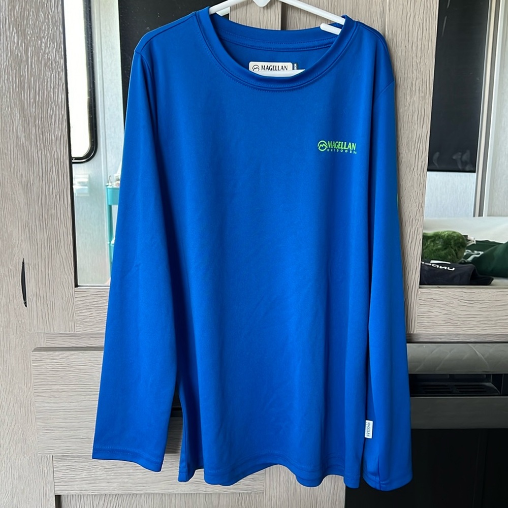Magellan boy fishing shirt, size M (10-12)